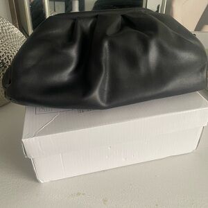 NWNT Black foux Leather Bag with Crescent Shape and shoulder strap